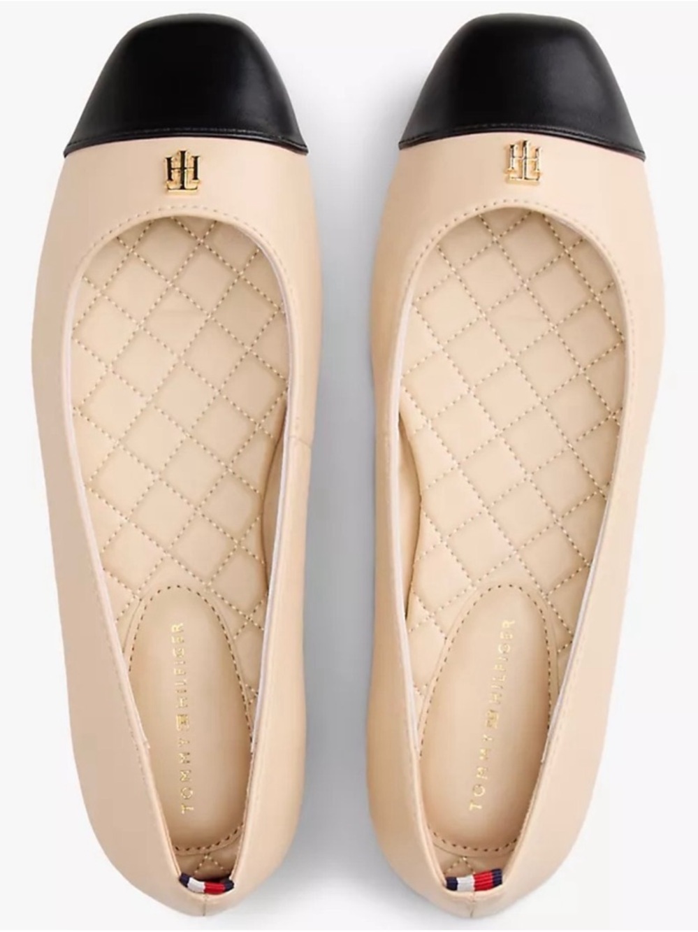 Tommy Hilfiger Beige Flats with Black Cap Toe and Gold Logo